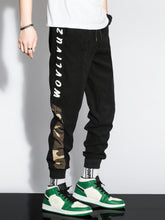 Load image into Gallery viewer, Love God. Store Men Pants Men Letter Camo Print Drawstring Waist Tapered Pants price
